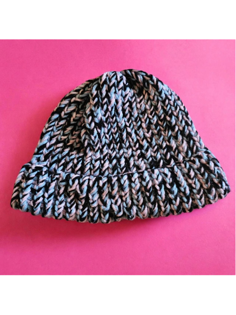 Handmade black, white, and light blue knit beanie #handmade #knitwear